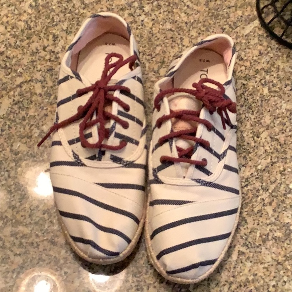 Toms tan with navy blue stripe